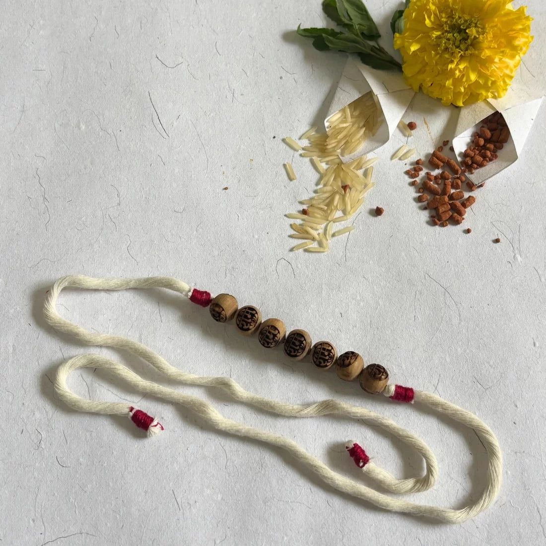 Tulsi Bead Rakhi - Ram Carved | Natural Dyed Organic Cotton | Eco-Friendly