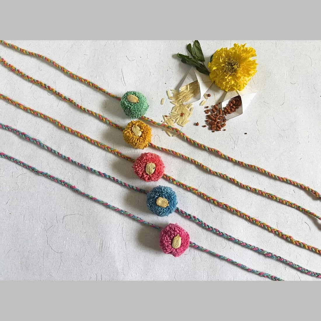 Pom Pom Seed Rakhi - Recycled Yarn Handmade | Set of 3 or Set of 5