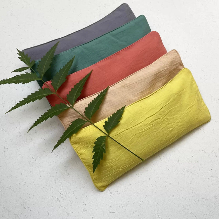 Handcrafted herbal eye pillow infused with the wisdom of Ayurveda.