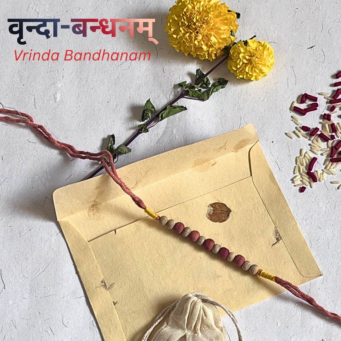 Nature Inspired Rakhi handcrafted with naturally dyed organic cotton threads and natural wooden beads. Includes cotton potli, Tilak, Akshat and a handmade recycled cotton rag envelope.