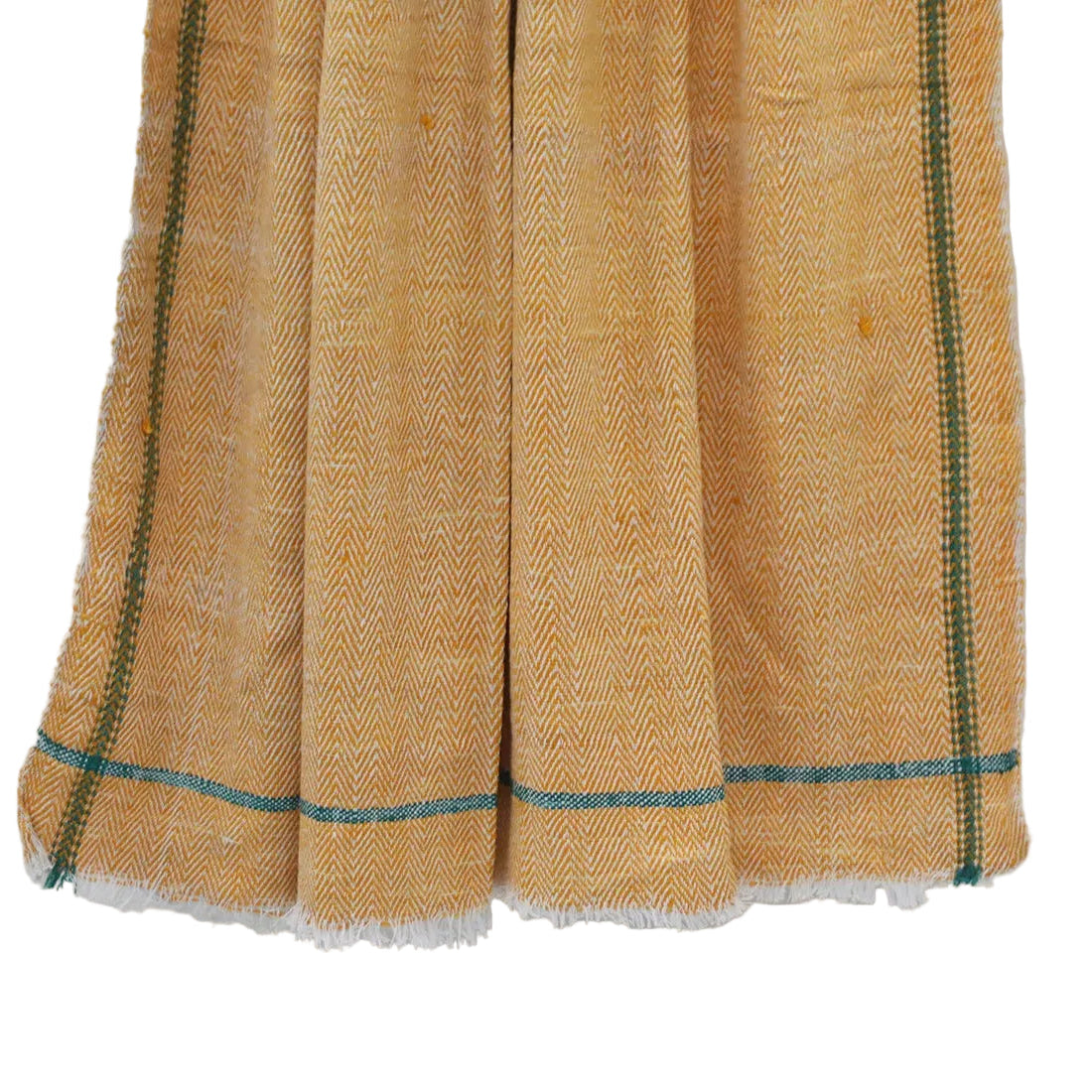 Warm, cheerful, and wonderfully soft, this Handloom Cotton Throw is woven from 100% hand-spun cotton yarn in a classic herringbone weave pattern. The sunny mustard yellow and white colour combination is lifted by a subtle green border running along both sides — a thoughtful finishing detail that adds quiet elegance to the overall design. Fabric: 100% Handwoven Cotton (hand-spun yarn) Weave: Herringbone pattern Size: 50 x 90 inches (127 x 229 cm) Colour: Mustard Yellow and White with Green border Light, soft
