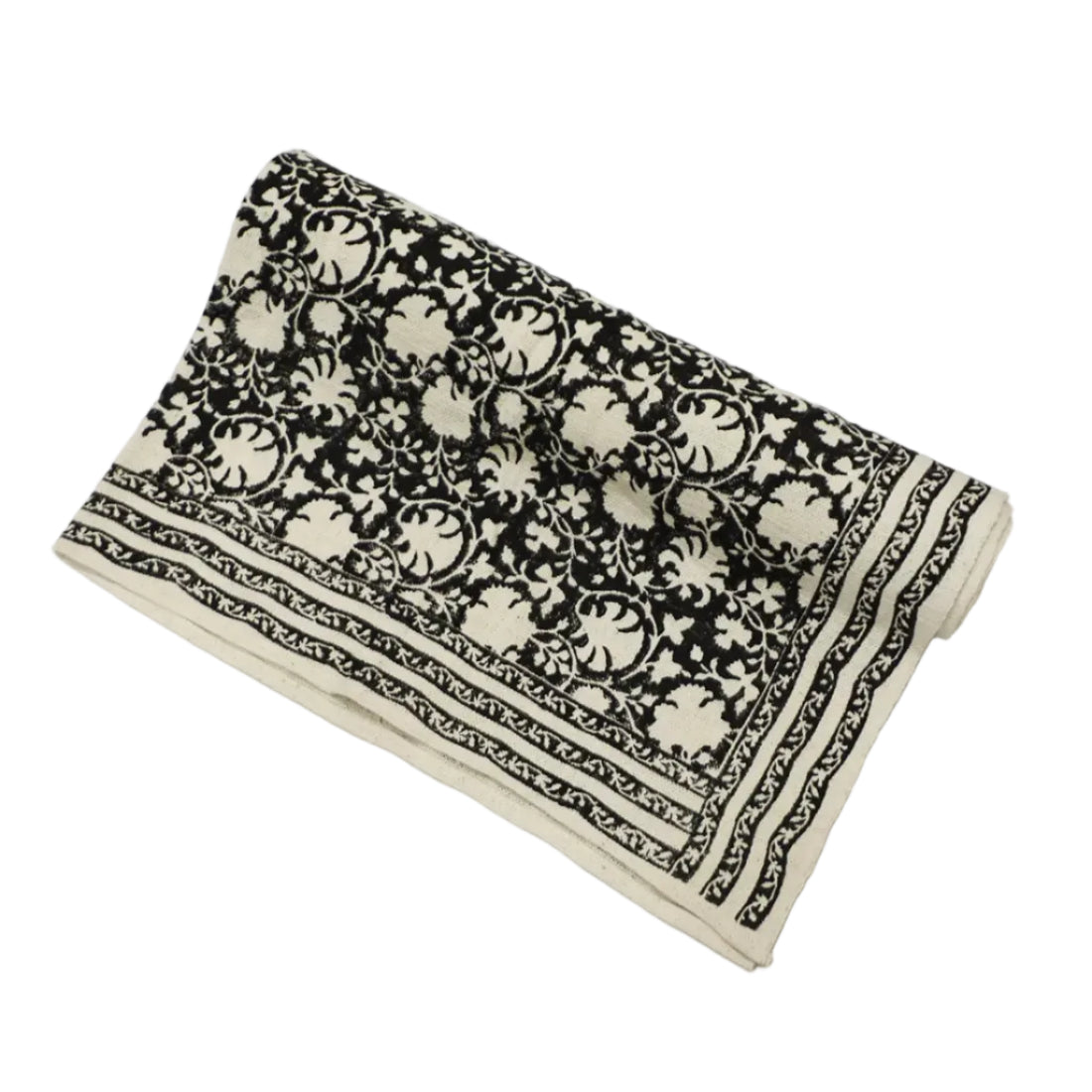 Crafted with care and character, this Handloom Cotton Throw Blanket is handwoven from 100% hand-spun cotton yarn — a process that imparts a natural softness that only gets better with time. A beautiful block-printed floral design adorns the surface, while a subtle woven border on both sides adds a refined finishing touch. Fabric: 100% Handwoven Cotton (hand-spun yarn) Size: 46 x 78 inches (117 x 198 cm) Colour: Natural and Black Print: Block print floral design Light, soft, and cosy all at once 