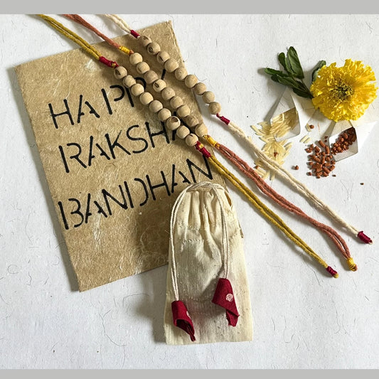 Tulsi bead rakhi brick red natural dyed organic cotton eco friendly handmade rakshabandhan