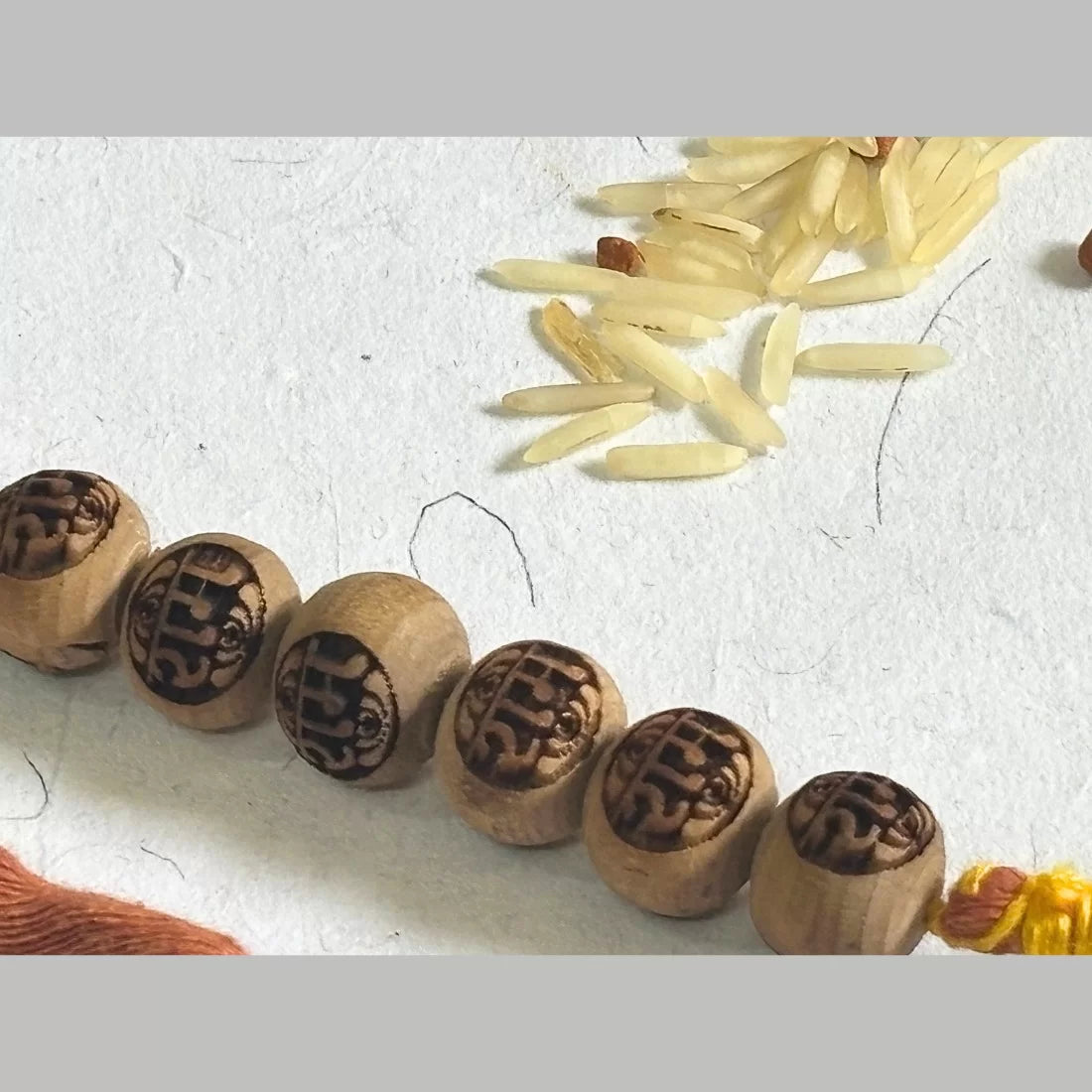 Tulsi Bead Rakhi - Ram Carved | Natural Dyed Organic Cotton | Eco-Friendly