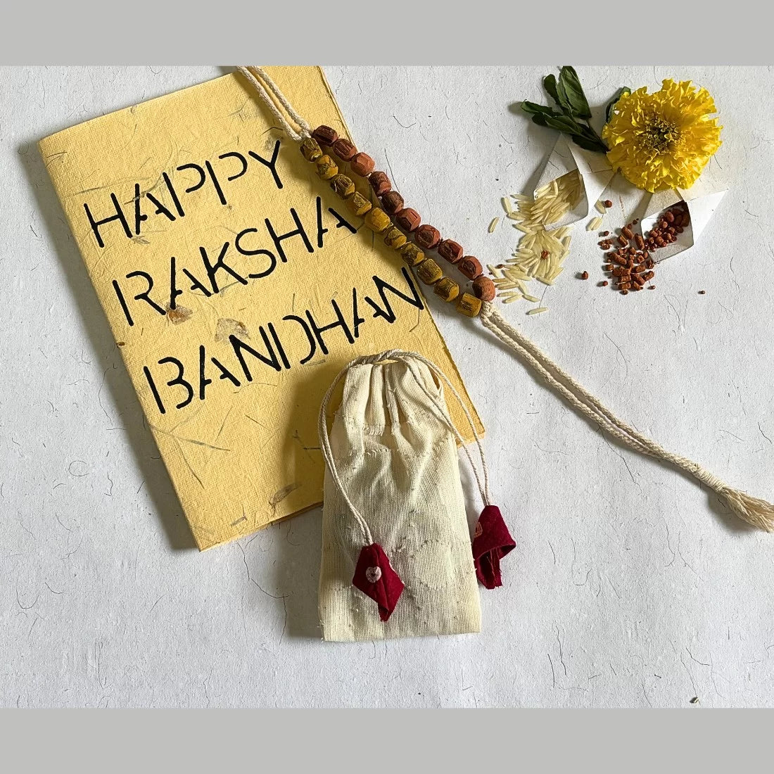 Tulsi Bead Rakhi | Madder Red & Turmeric Yellow | House of Swadeshi
