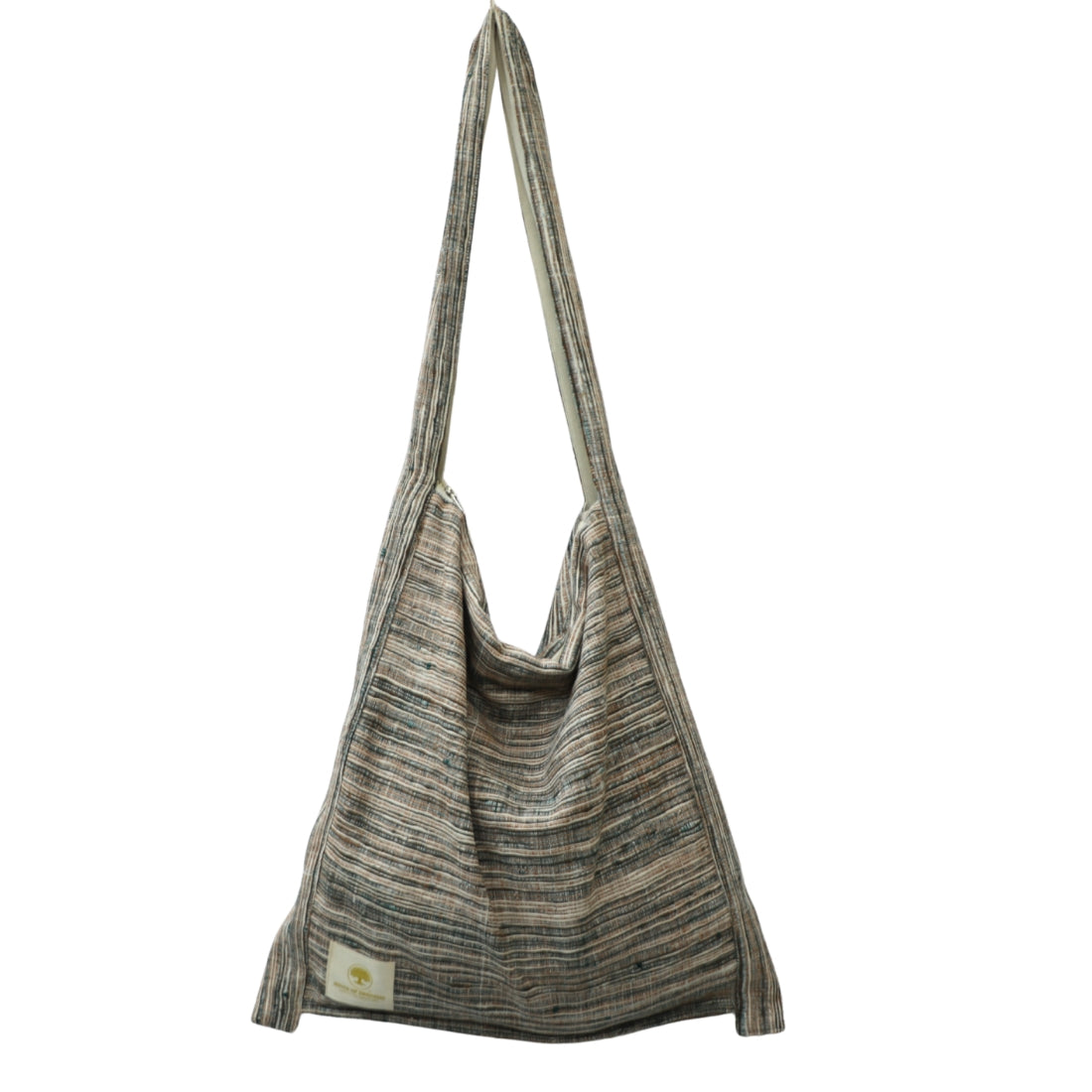  Earthy olive green woven into white handloom cotton gives this boho jhola bag its grounded, nature-inspired character. Lightweight yet substantial, it's a carry that speaks the language of conscious, craft-forward living.